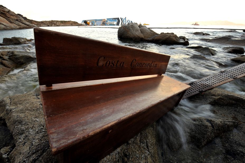A bench from the cruise liner is seen on the shore on January 20, a week after the ship ran aground. More than 30 people from eight countries -- both crew and passengers -- died.