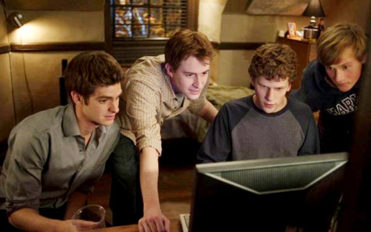 "The Social Network," David Fincher's movie about the founding of Facebook, hits theaters, making Mark Zuckerberg a household name. The film is a critical and commercial hit, earning $225 million worldwide and winning three Oscars. Zuckerberg calls the movie a largely inaccurate dramatization but says it gets his casual wardrobe right.