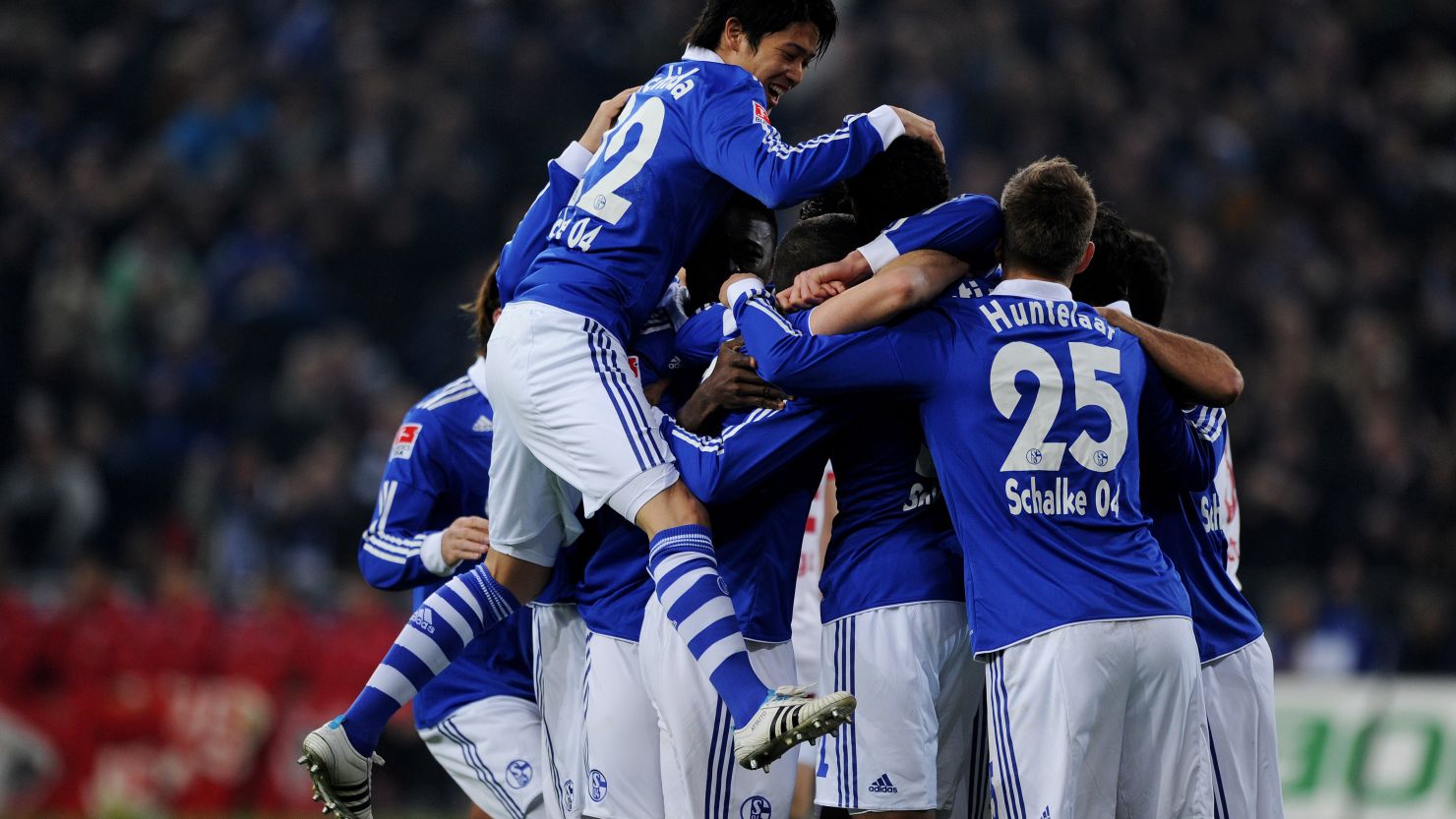 Schalke players celebrate a goal during a 3-1 win over Stuttgart in the Bundesliga on Saturday 