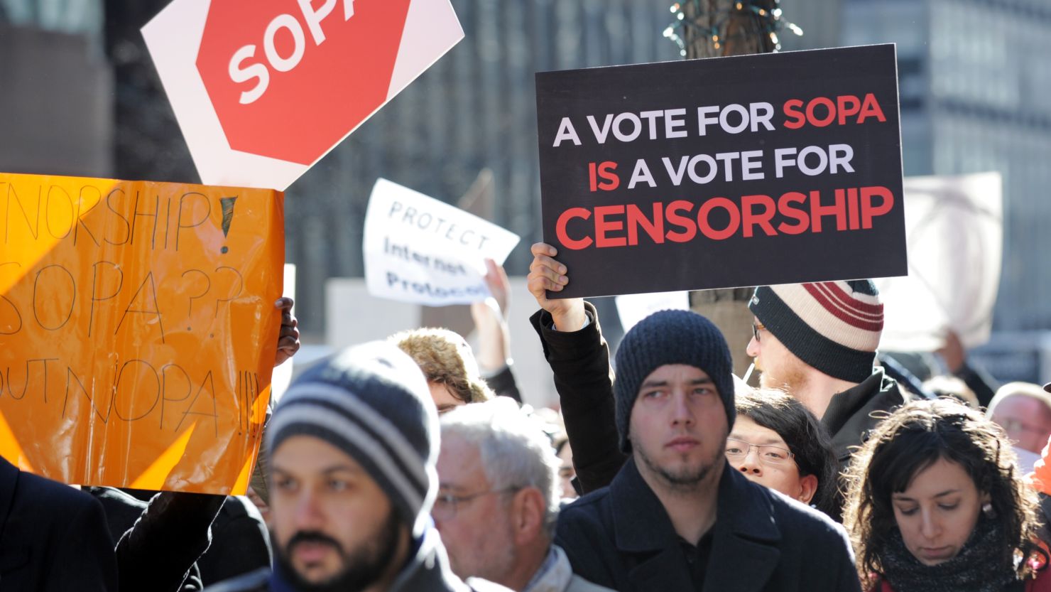 Opponents of legislation targeting Internet piracy demonstrate outside the offices of New York's U.S. senators in January. 