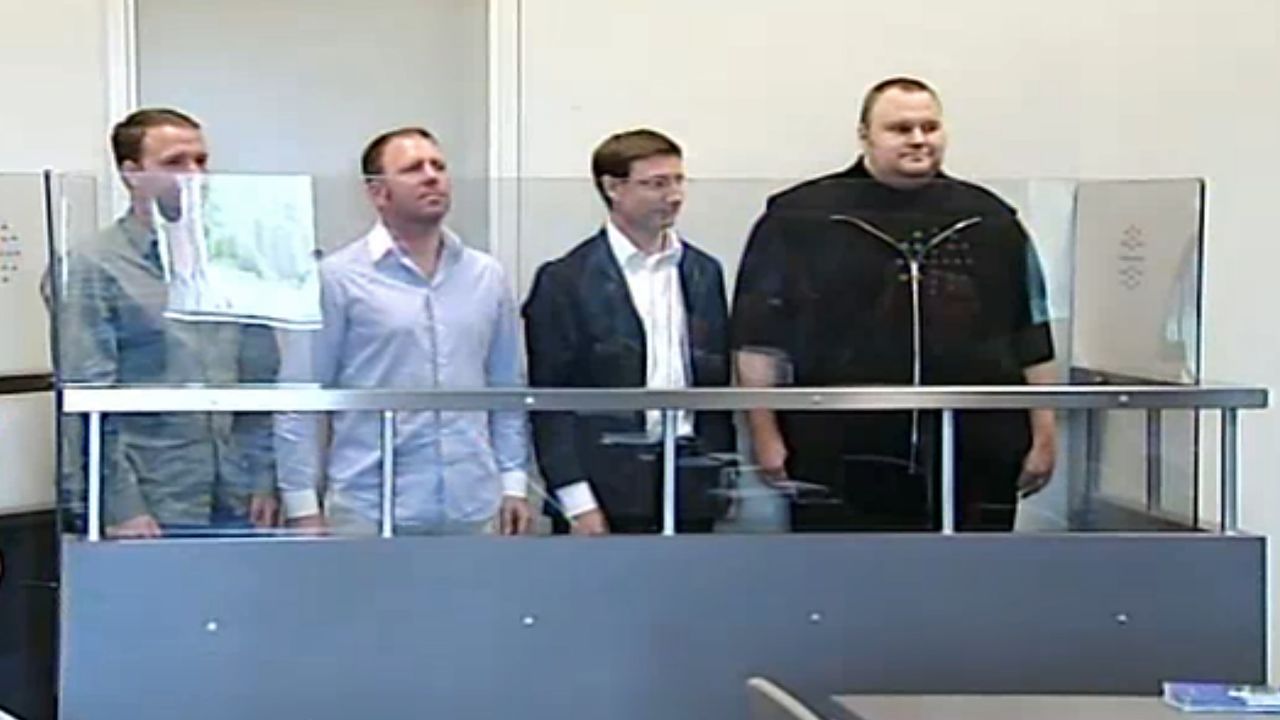 This TV grab shows internet guru and Megaupload founder Kim Schmitz, far right, at an Auckland, New Zealand, court Friday.