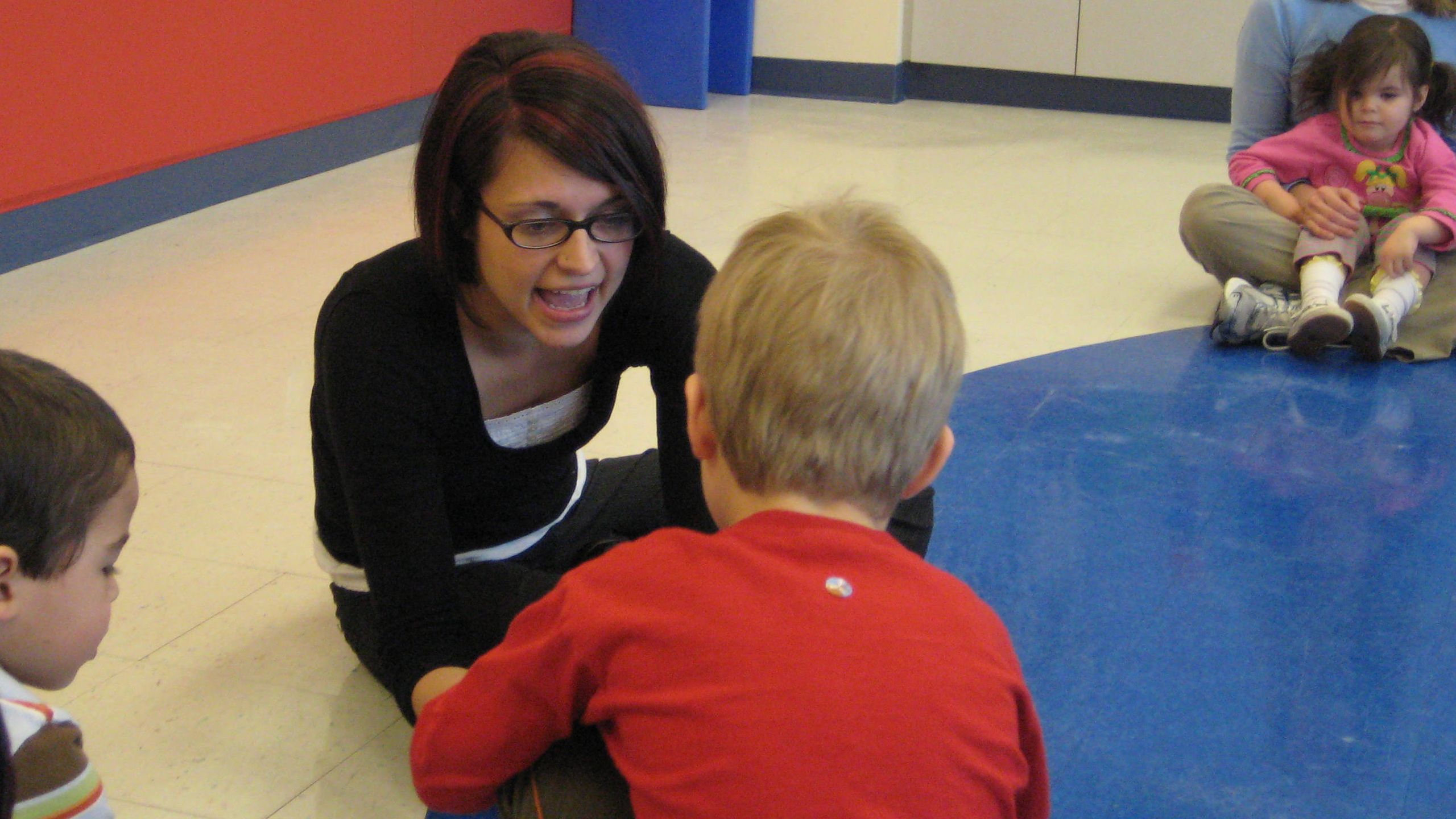 Stefanie Waldrop teaches children at the Marcus Autism Center in Atlanta, Georgia, on March 5, 2009. The center works with children who have developmental disabilities.