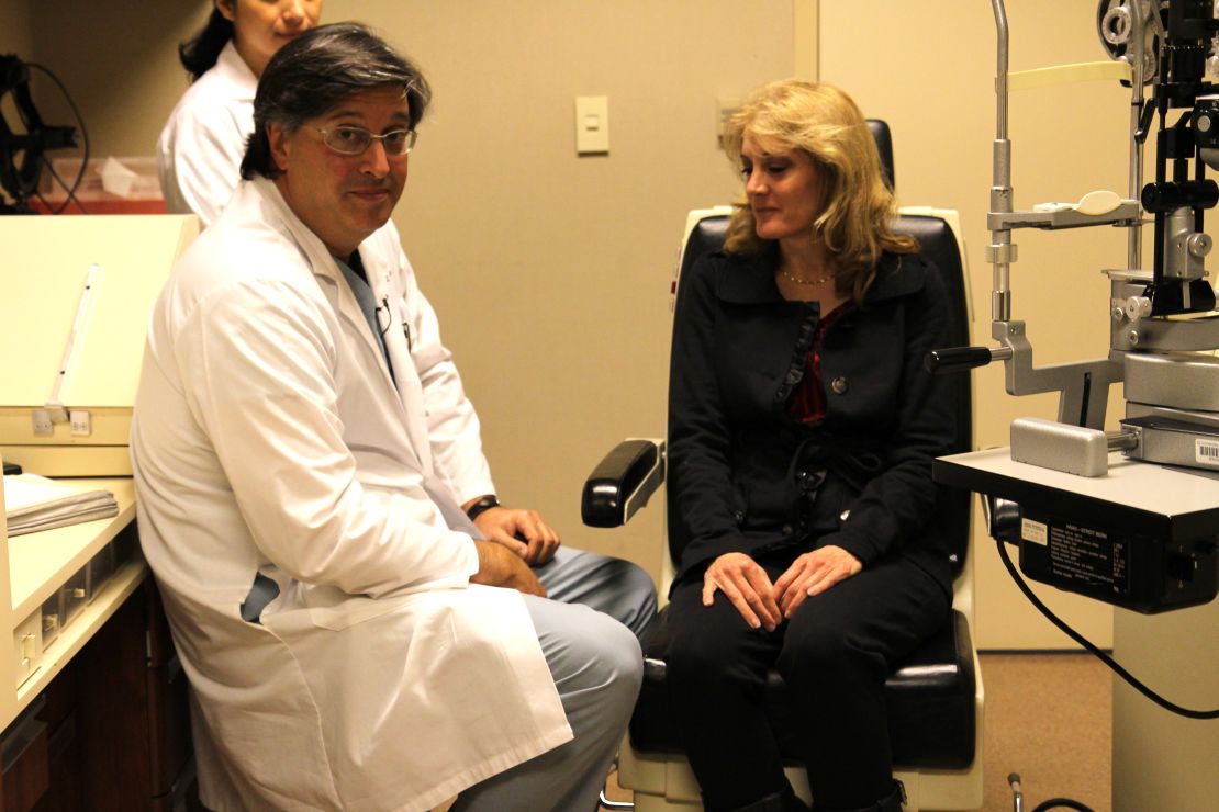 Dr. Steven Schwartz and a 51-year-old patient who says her vision has improved after stem cell treatment.