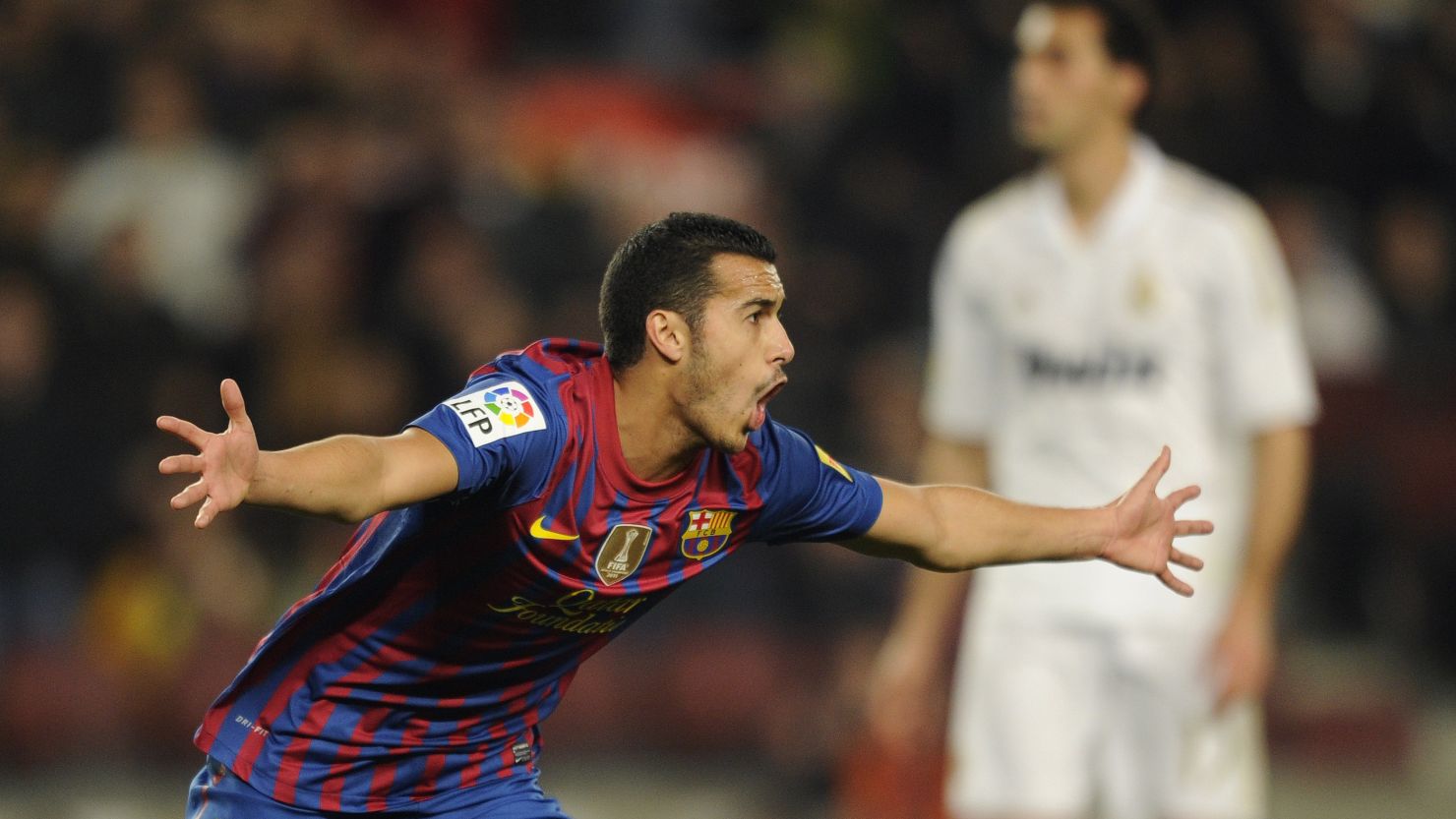 Barcelona's Pedro celebrates after scoring the opening goal in the Spanish Cup quarterfinal against Real Madrid.
