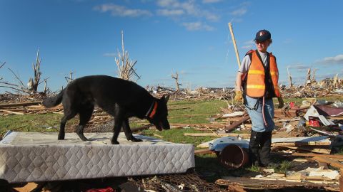 A search team looks for possible victims from the tornado that hit Joplin, Missouri, in May of 2011.
