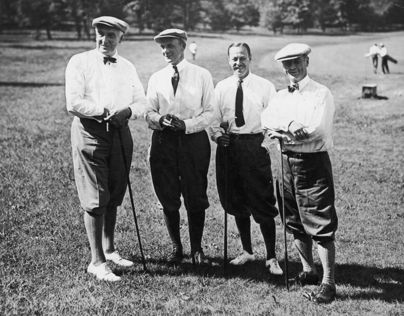 President Warren Harding, left, gets ready to golf on the Piping Rock Golf Links on Long Island, New York, in 1921. He's with Howard Whitney, second from left, president of the U.S. Golf Association; financier Percy Pyne; and industrialist J. Leonard Replogle.
