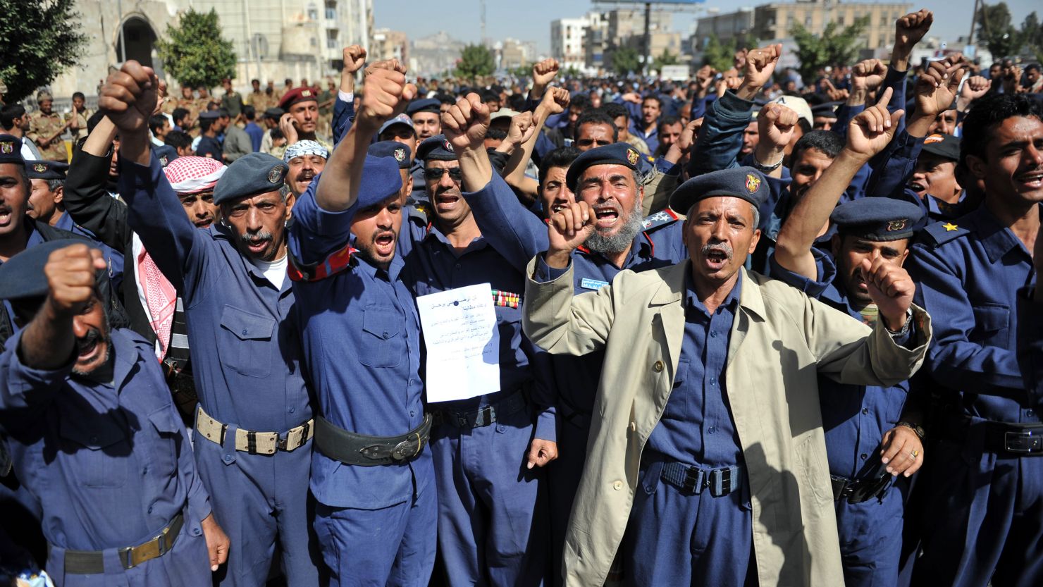 Yemeni air force personnel demand the removal of the president's half-brother as air force  chief in a rally Saturday in Sanaa.