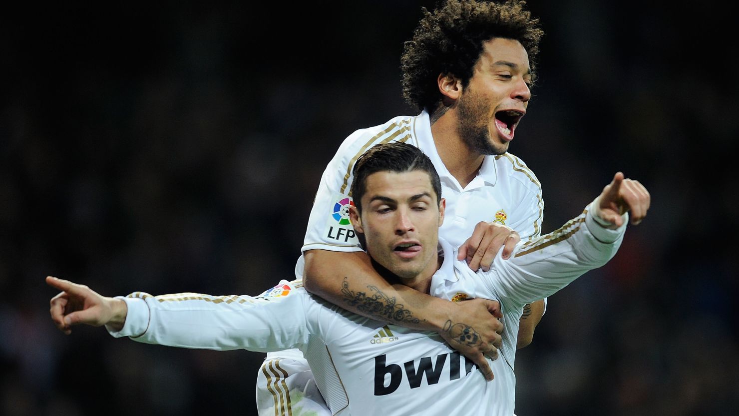 Cristiano Ronaldo celebrates with Marcelo after scoring Real Madrid's second goal against Real Zaragoza 
