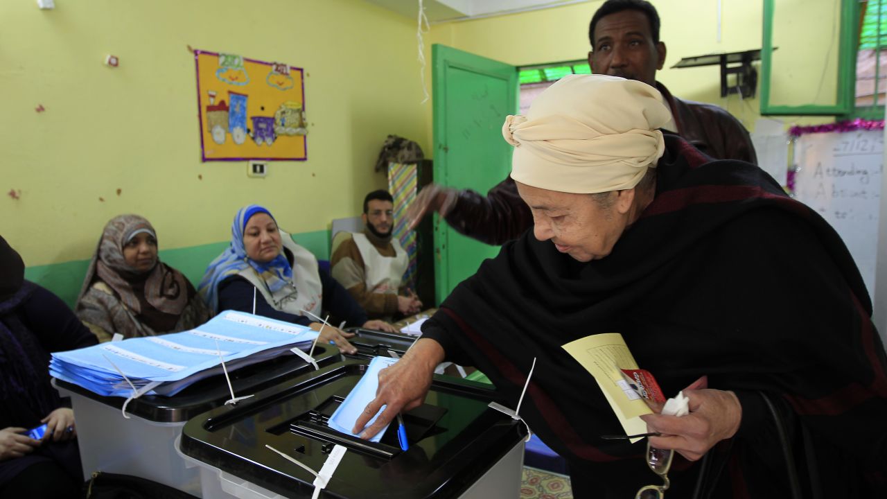 An Egyptian woman casts her ballot at a polling station in Cairo's Zamalek neighbourhood. 