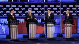 JACKSONVILLE, FL - JANUARY 26: Republican presidential candidates (L-R) former U.S. Sen. Rick Santorum, former Speaker of the House Newt Gingrich (R-GA), former Massachusetts Gov. Mitt Romney and U.S. Rep. Ron Paul (R-TX) participate in a debate moderated by CNN's Wolf Blitzer (R) at the University North Florida on January 26, 2012 in Jacksonville, Florida. The debate is the last one before the Florida primaries January 31st. (Photo by Joe Raedle/Getty Images) 