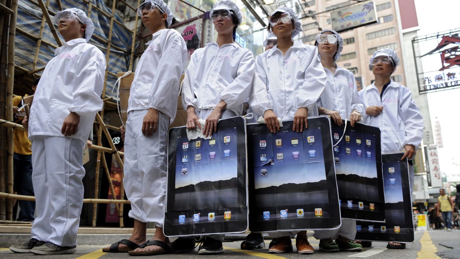 People stage a protest against Foxconn, which manufactures Apple products in mainland China, in May 2011 in Hong Kong. 