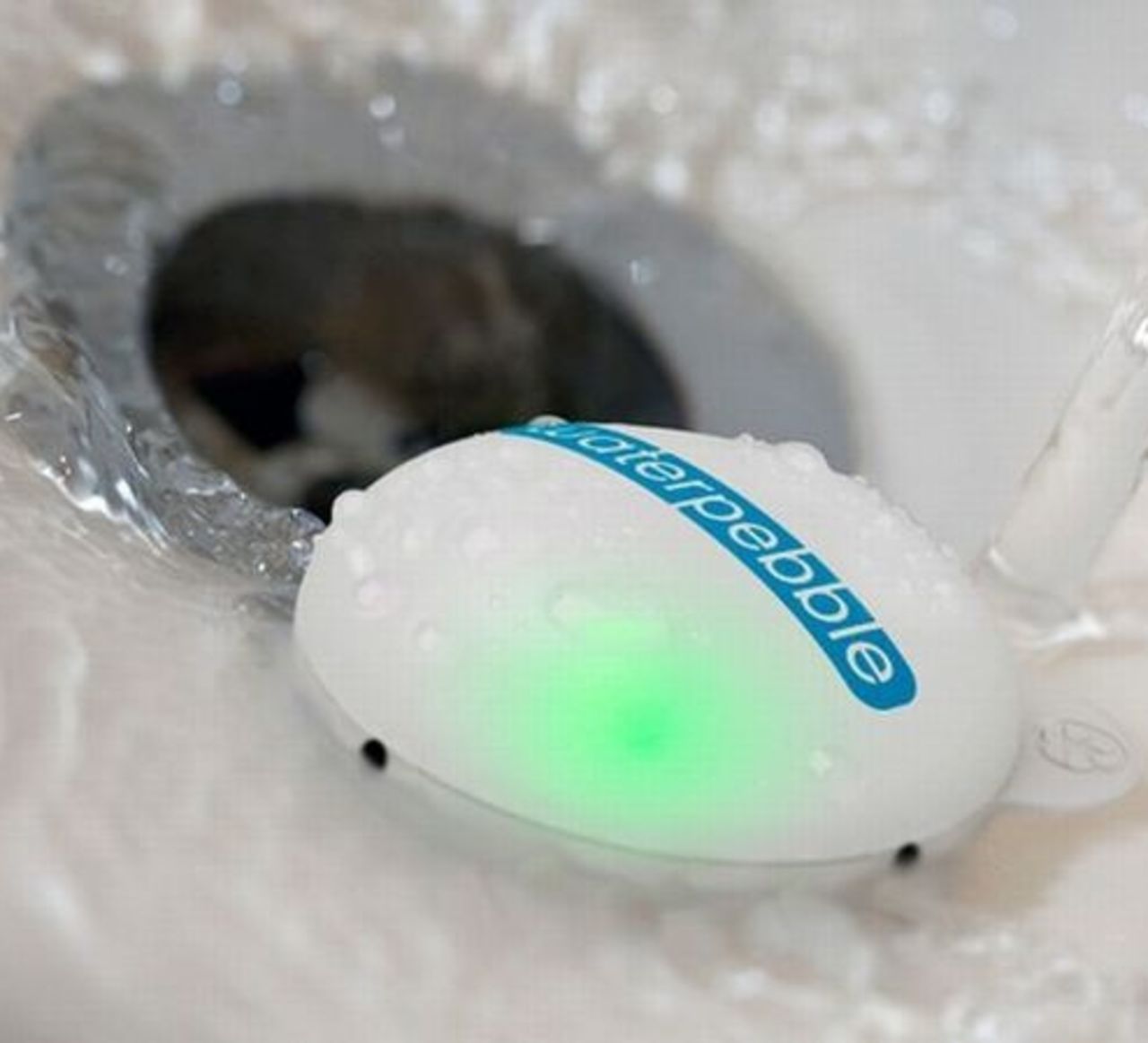 The "Waterpebble" monitors water going down the plughole when you shower and tells you when to finish showering. It memorizes the length of your first shower and, using it as a benchmark, fractionally reduces your shower time, helping you to save water without thinking about it. 