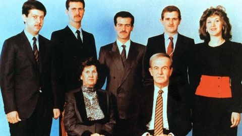 An undated picture shows Syrian President Hafez al-Assad and his wife Anisseh posing for a family picture with his children Maher, Bashar, Basil, who died in a car accident in 1994, Majd and Bushra.