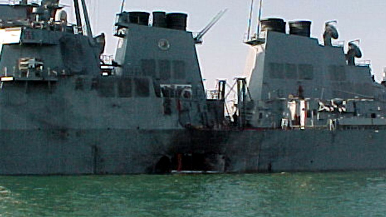 The USS Cole sits off the coast of Yemen after a terrorist attack blew a hole in its side. Seventeen US sailors died in the 2000 attack.