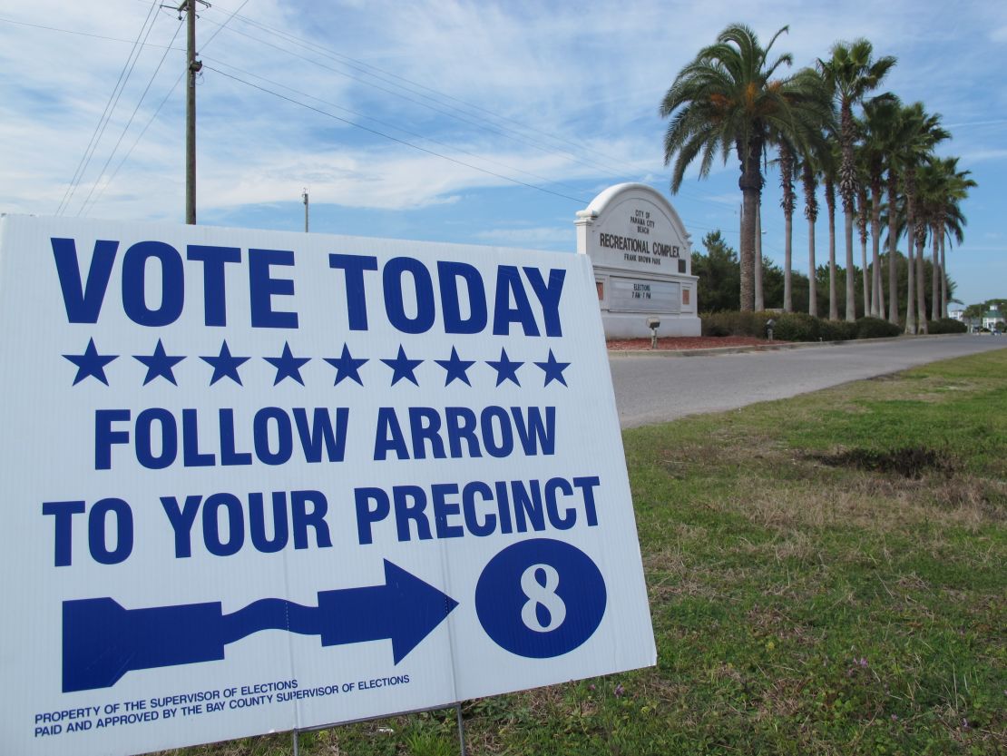 A sign guides voters to the polls in Panama City, Florida, on Tuesday. Fifty delegates are at stake in the GOP presidential primary.