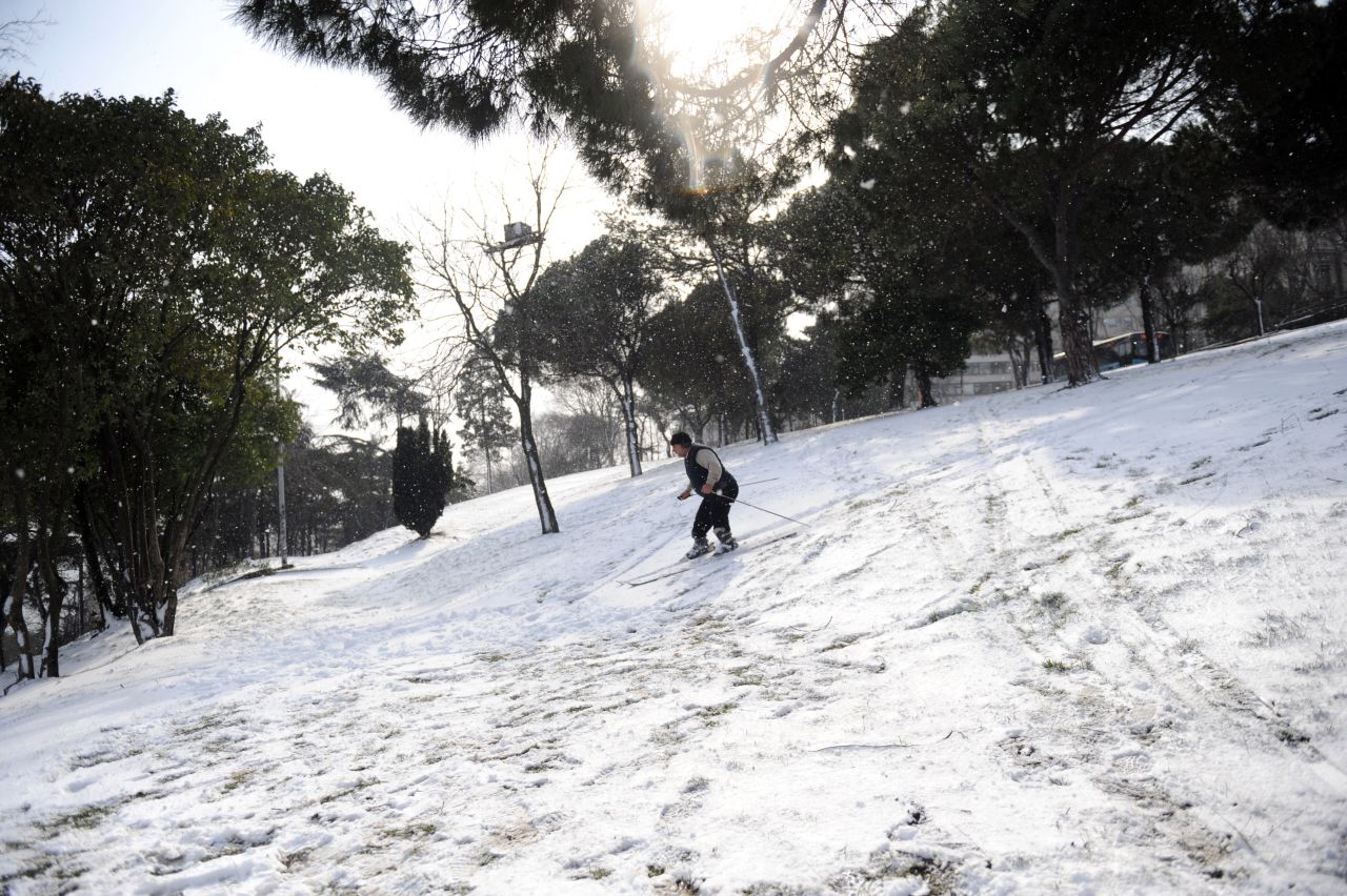 A skier takes advantage of the unusual snowfall in Istanbul, Turkey, on Tuesday. The snow paralyzed daily life there.