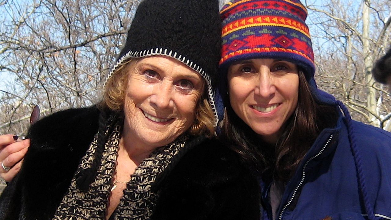 Selig poses for a photo with her mom, who is now battling end-stage lung cancer.