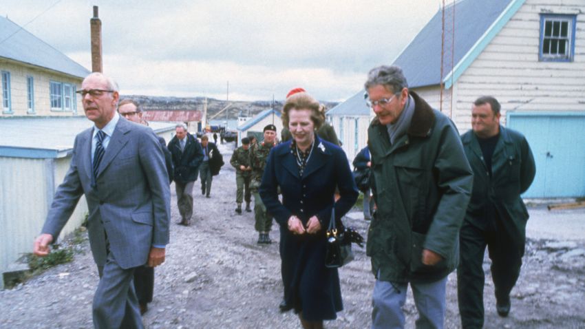 British Prime Minister Margaret Thatcher and her husband Denis (1915 - 2003, left) visit Stanley Junior School, Stanley in the Falkland Islands, 1983. 