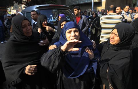Egyptian women mourn victims of the riot at a morgue in Cairo on February 2.