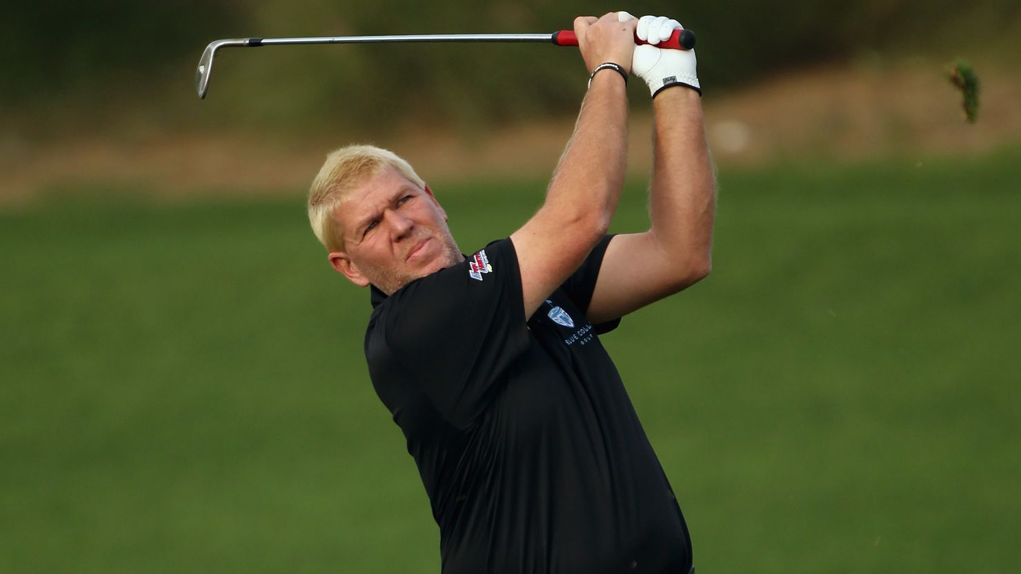 John Daly described conditions on day one of the Qatar Masters as "brutal" after sandstorms raged on the course.