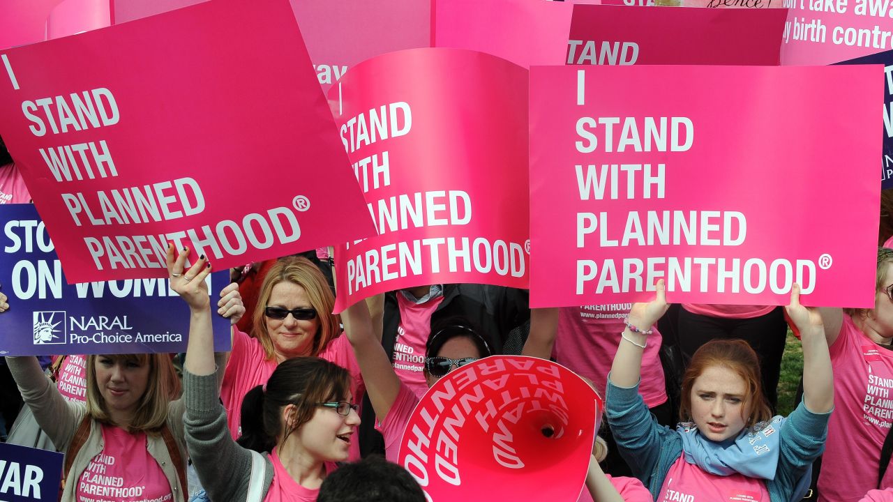 Rally participants support Planned Parenthood at the National Mall in Washington on April 7, 2011.