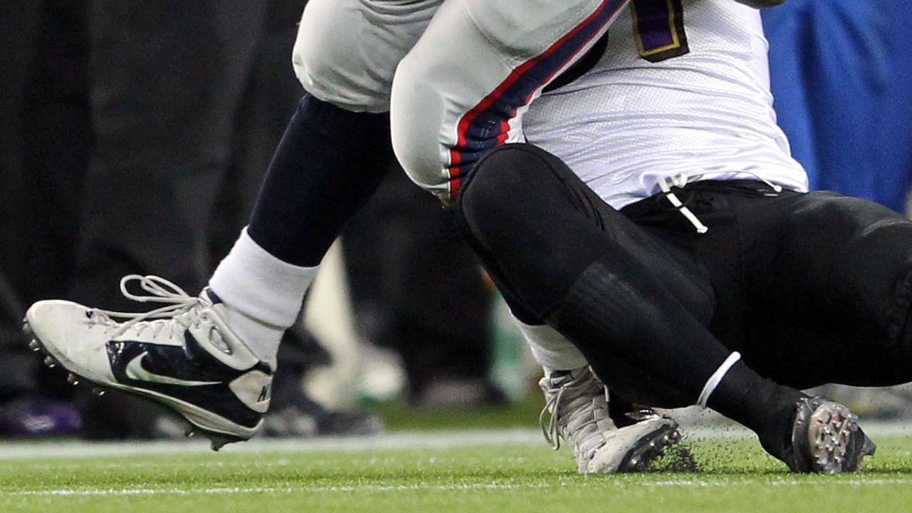 Patriots' Rob Gronkowski's ankle twisted during this tackle in the January 22 AFC championship against the Baltimore Ravens.