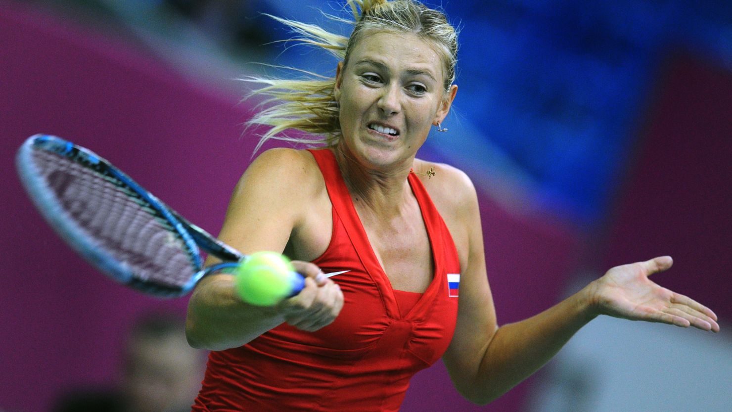 Maria Sharapova got Russia off to a winning start in their Fed Cup tie with Spain.