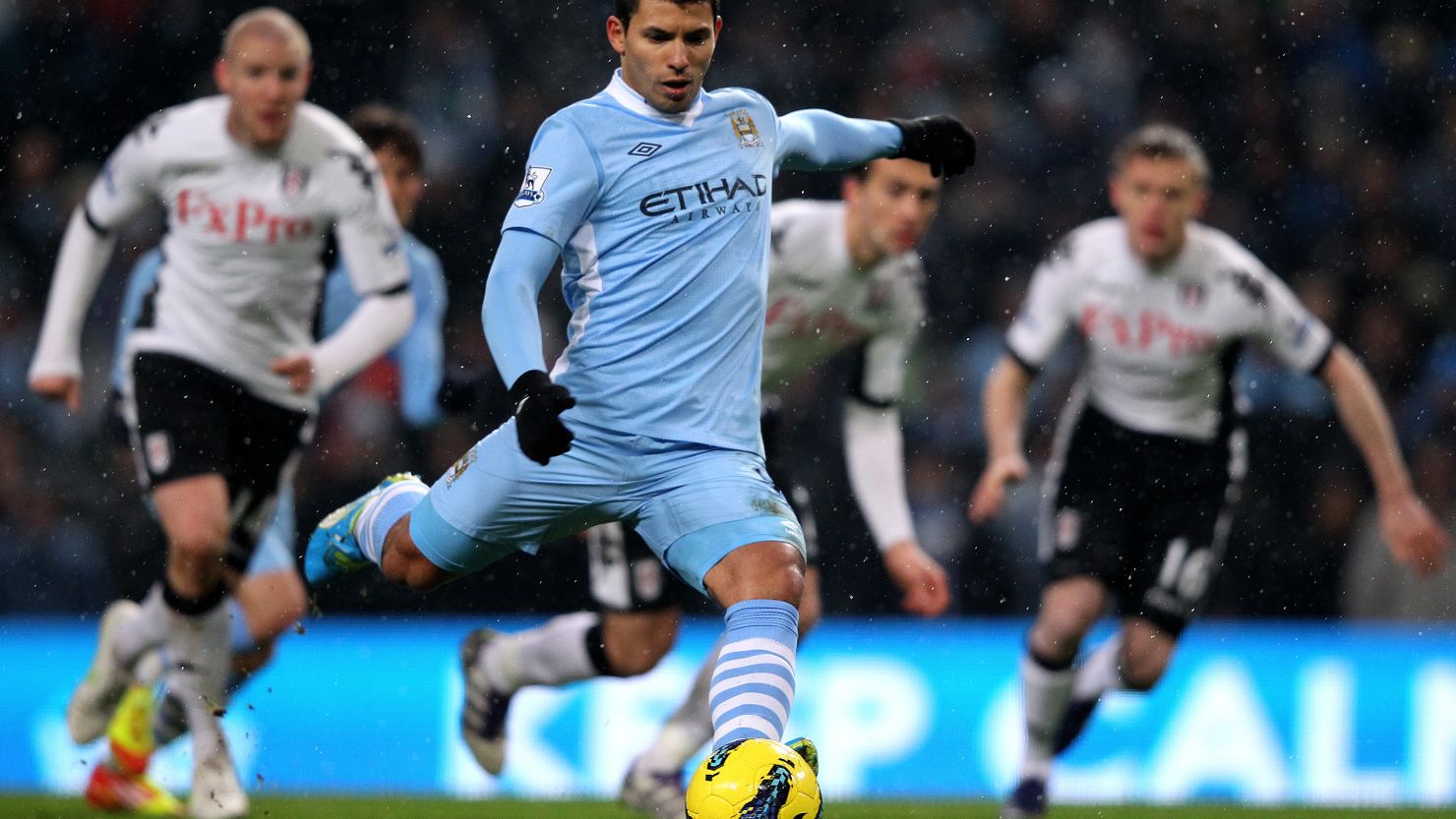 Sergio Aguero fires home from the penalty spot to give Manchester City the lead against Fulham at the Etihad Stadium.