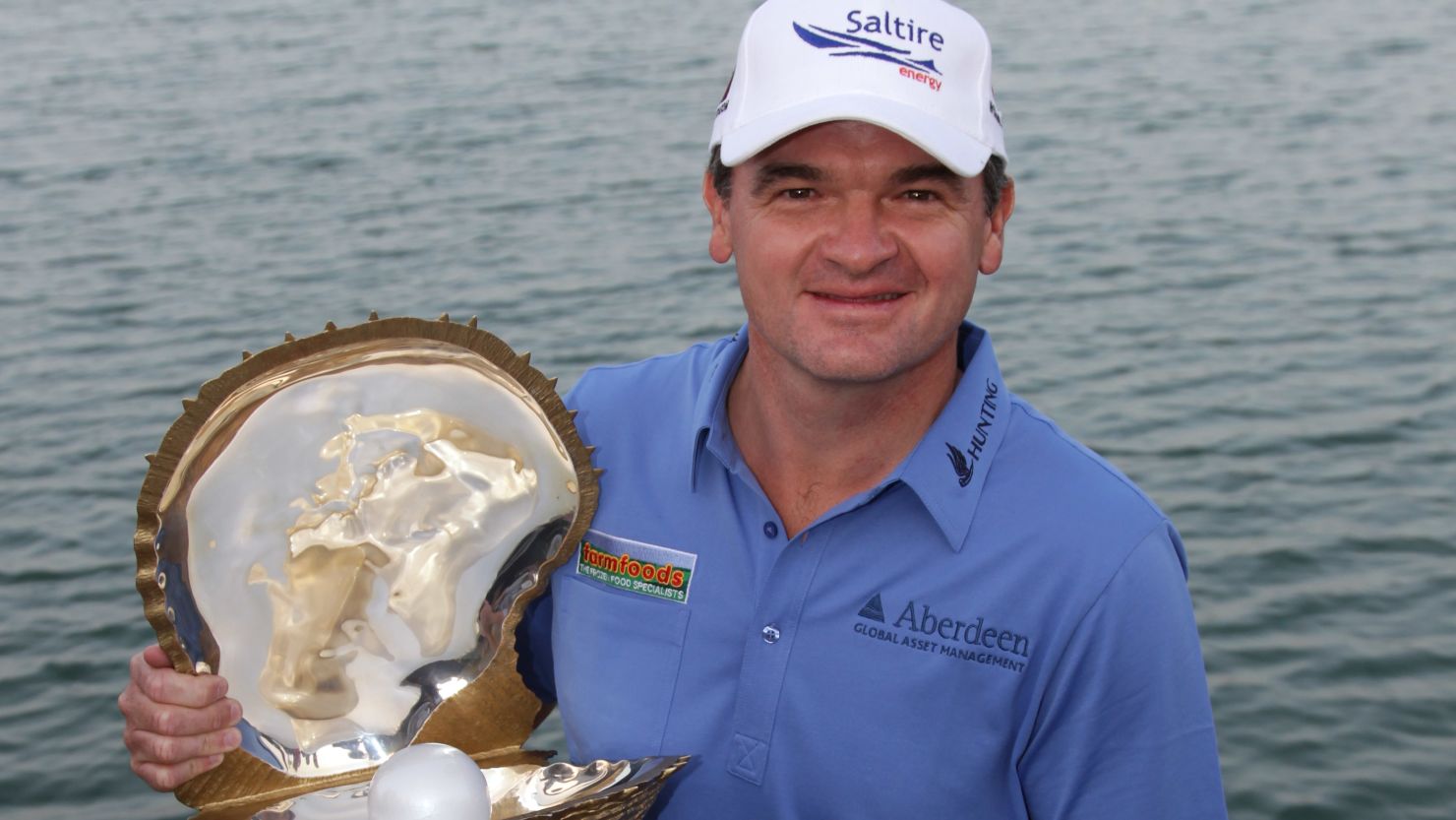 Paul Lawrie's final round 65 ensured he collected the Qatar Masters trophy for the second time in his career.