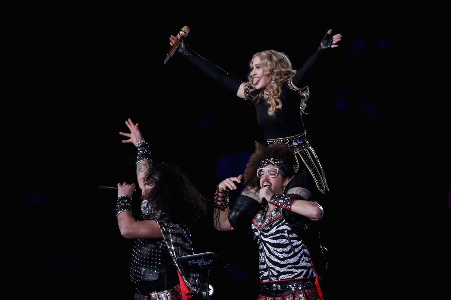 Madonna performs with Redfoo and Sky Blu of LMFAO, the twosome behind the chart-topping single "Sexy and I Know It."