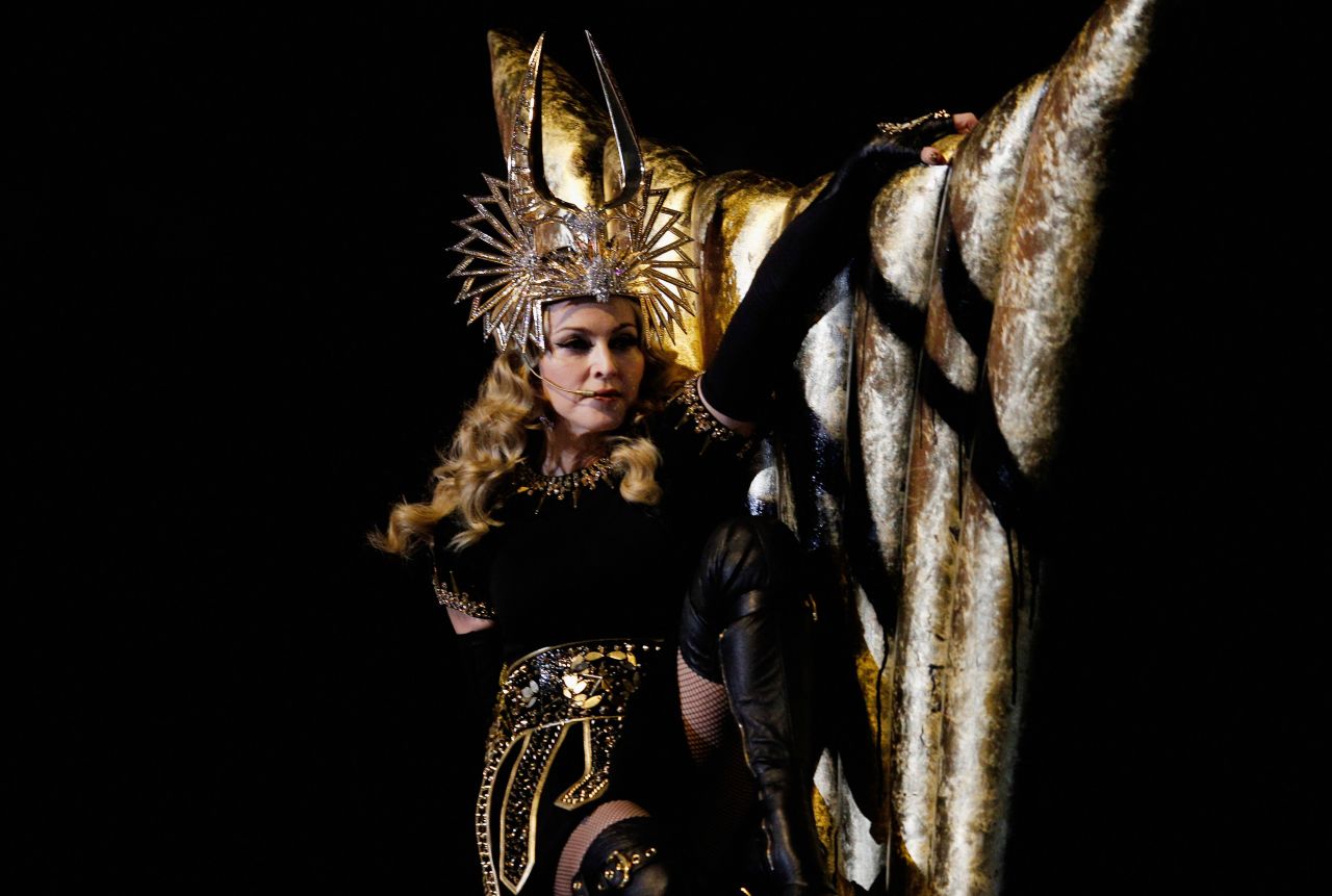 Madonna started her performance dressed as a Roman goddess clad in black and gold.