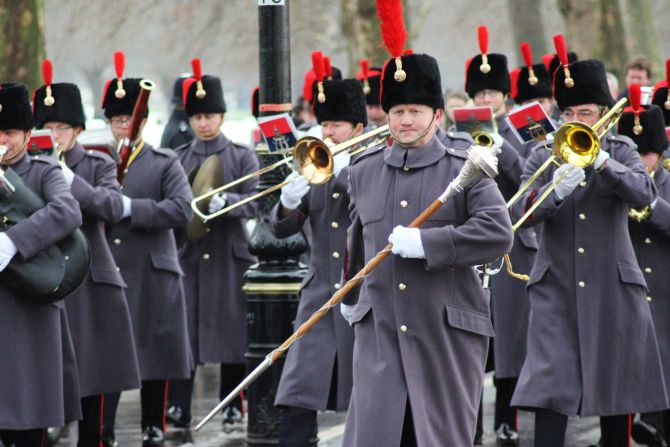 Meanwhile, the horses compete with the brass and drums of the marching band.  