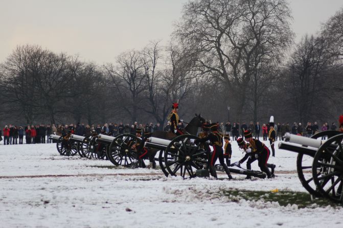 Despite the blistering cold, spectators gather to watch the salute in the picturesque west London park, home to Kensington Palace -- Princess Diana's former official residence. 