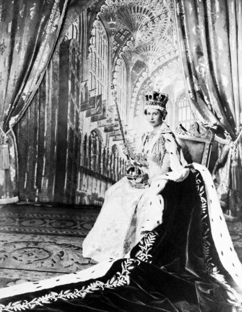 Queen Elizabeth II poses with the royal sceptre on June 2, 1953, after being crowned at Westminter Abbey in London.