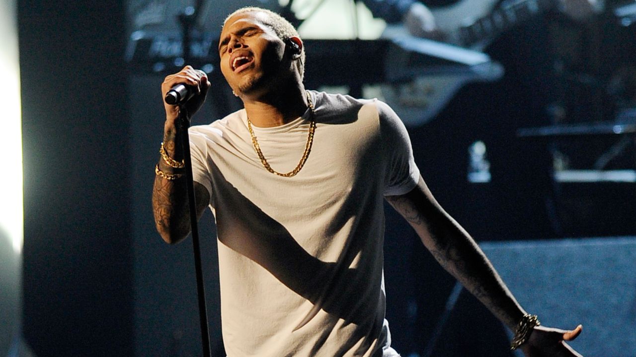 Singer Chris Brown performs onstage at the 2011 American Music Awards.