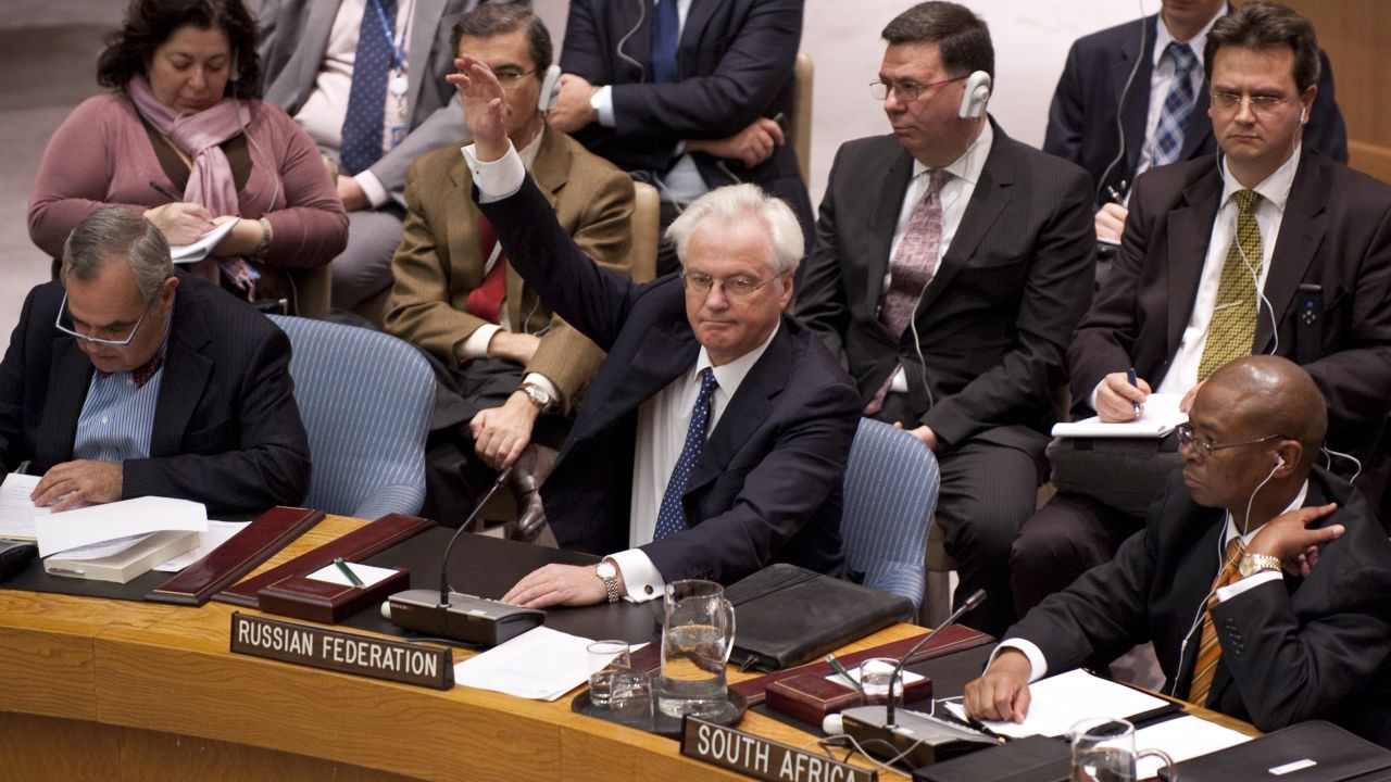 Russia's U.N. Ambassador Vitaly Churkin raises his hand to vote against the Syria resolution on February 4.