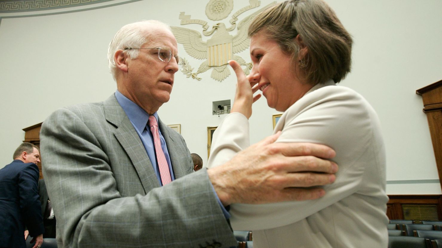 Then-Rep. Christopher Shays comforts ex-air force cadet Beth Davis after her 2006 testimony on sexual assault in the military.