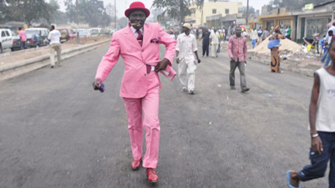 Smart suits in pastel colors are a trademark of the Brazzaville Sapeurs. 