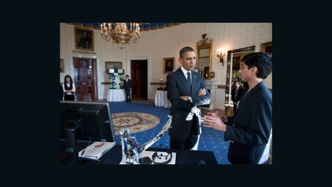 President Barack Obama meeting with a participant from the second annual White House Science Fair on February 7.