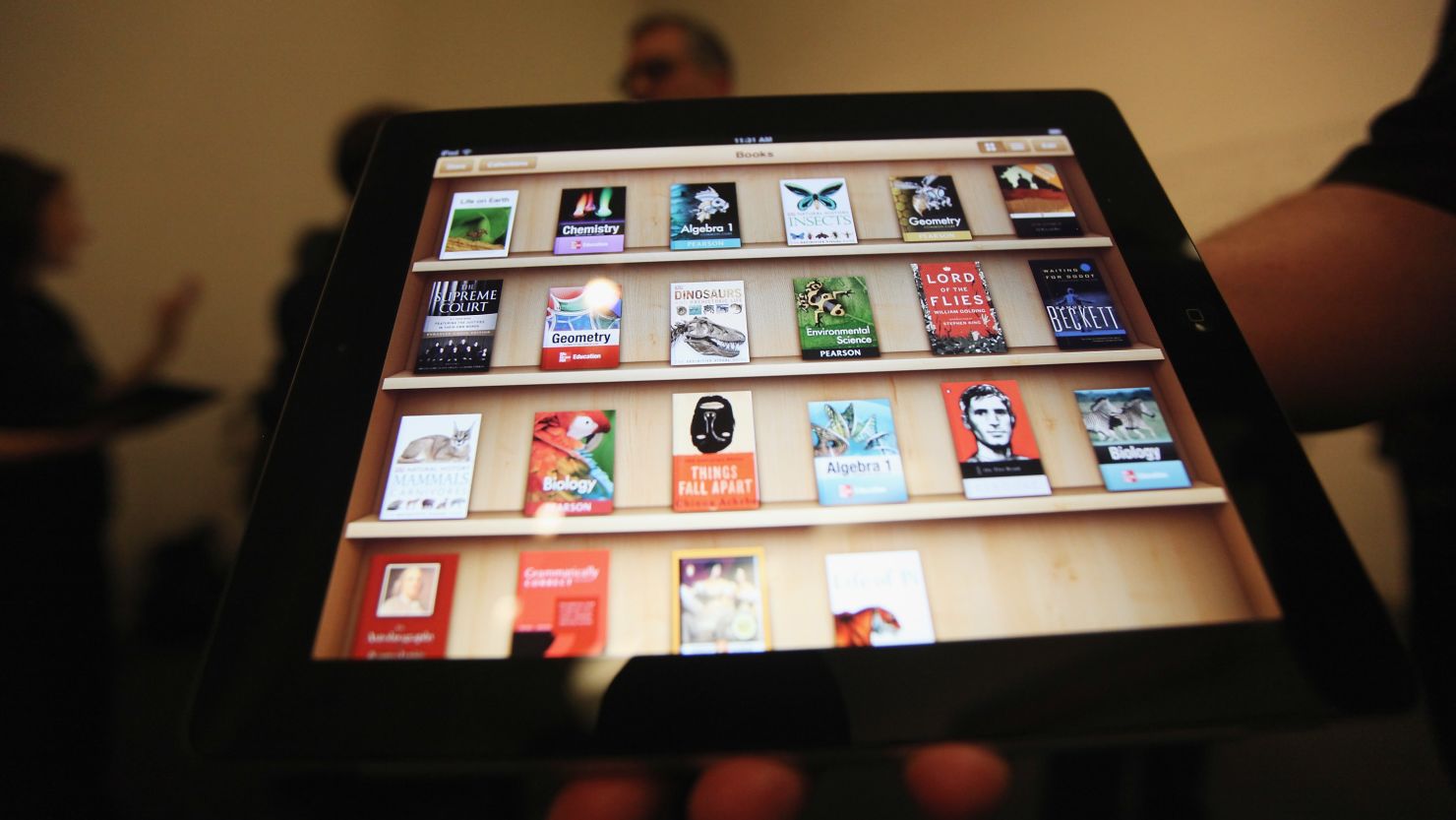 An Apple event demonstrates its iBooks 2 app on an iPad at New York's Guggenheim Museum in January.