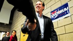 	BLAINE, MN - FEBRUARY 7: Republican presidential candidate, former U.S. Sen. Rick Santorum arrives at a campaign rally February 7, 2012 in Blaine, Minnesota. Santorum is looking for a win is at least one of the three nomination contests today, caucuses in Colorado and Minnesota and a non-binding vote in Missouri. (Photo by Ben Garvin/Getty Images) 