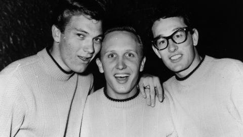 Buddy Holly, shown here in the extreme right, poses with The Crickets, Jerry Allison and Joe Mauldin in 1957.