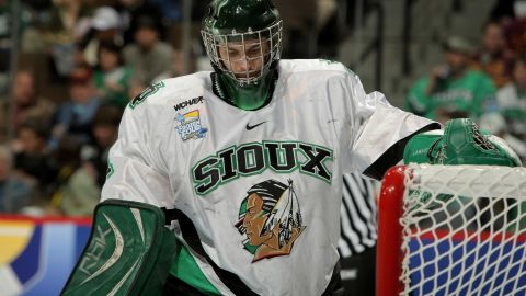 Jean-Philippe Lamoureux of the University of North Dakota Fighting Sioux tends goal during a game in Denver in 2008. 
