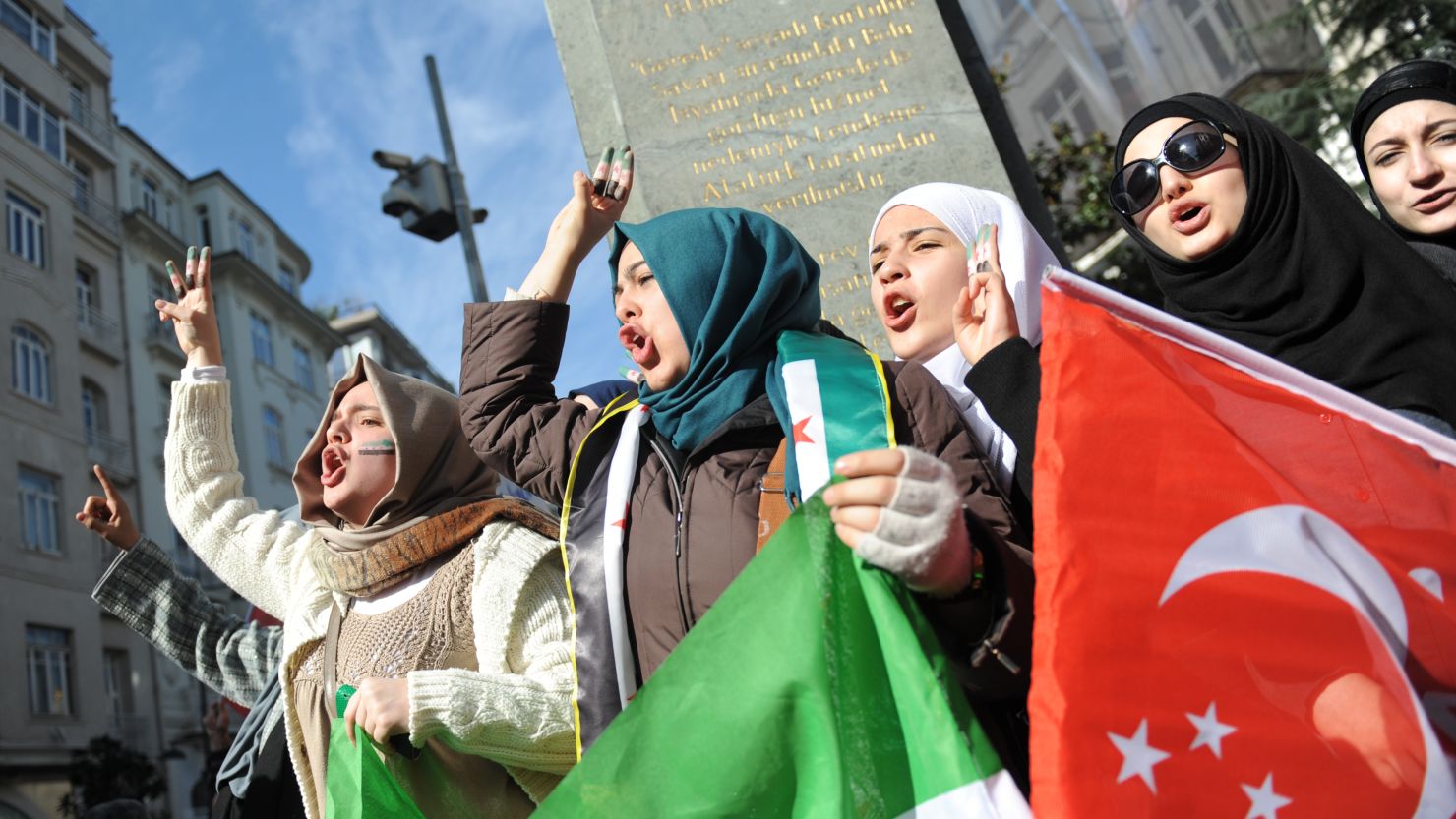 Demonstrators protest in front of the Syrian consulate in Istanbul, Turkey, this week.