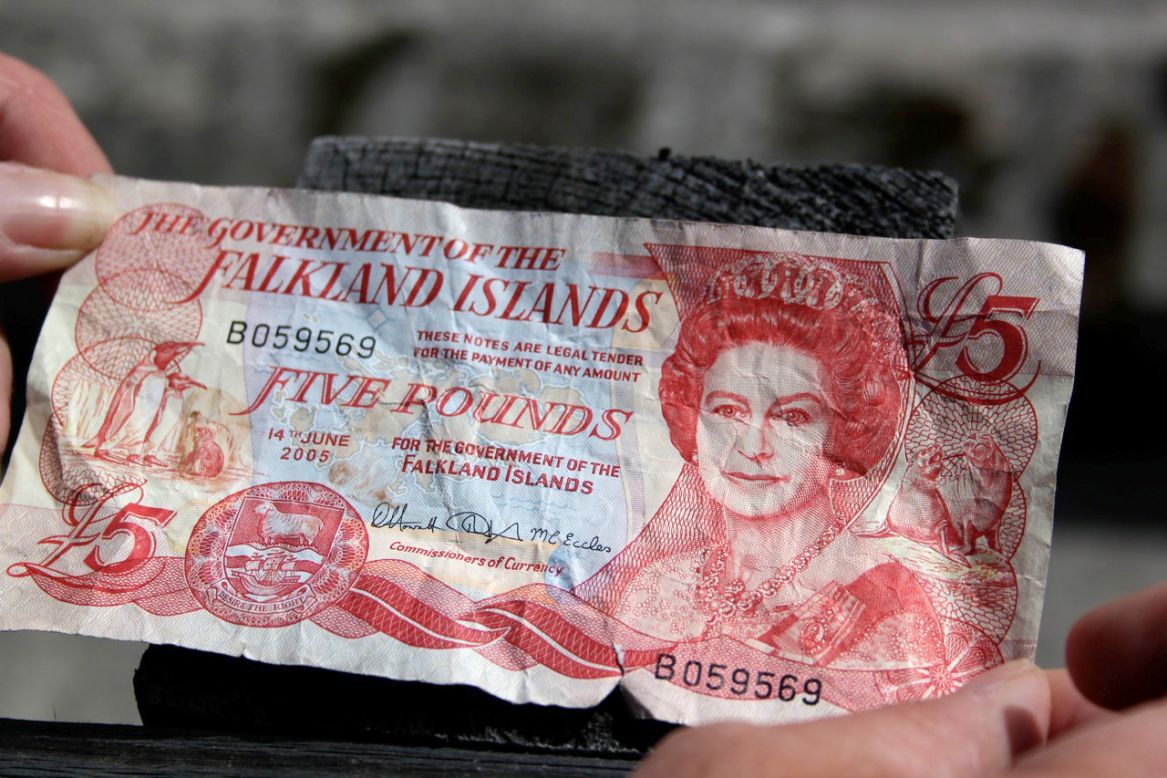  A Falklands Five pound note issued by the Falkland Islands Government; the disputed islands, which Argentina calls Las Malvinas, are viewed by Britain as a British Overseas Territory, like Bermuda or Gibraltar.