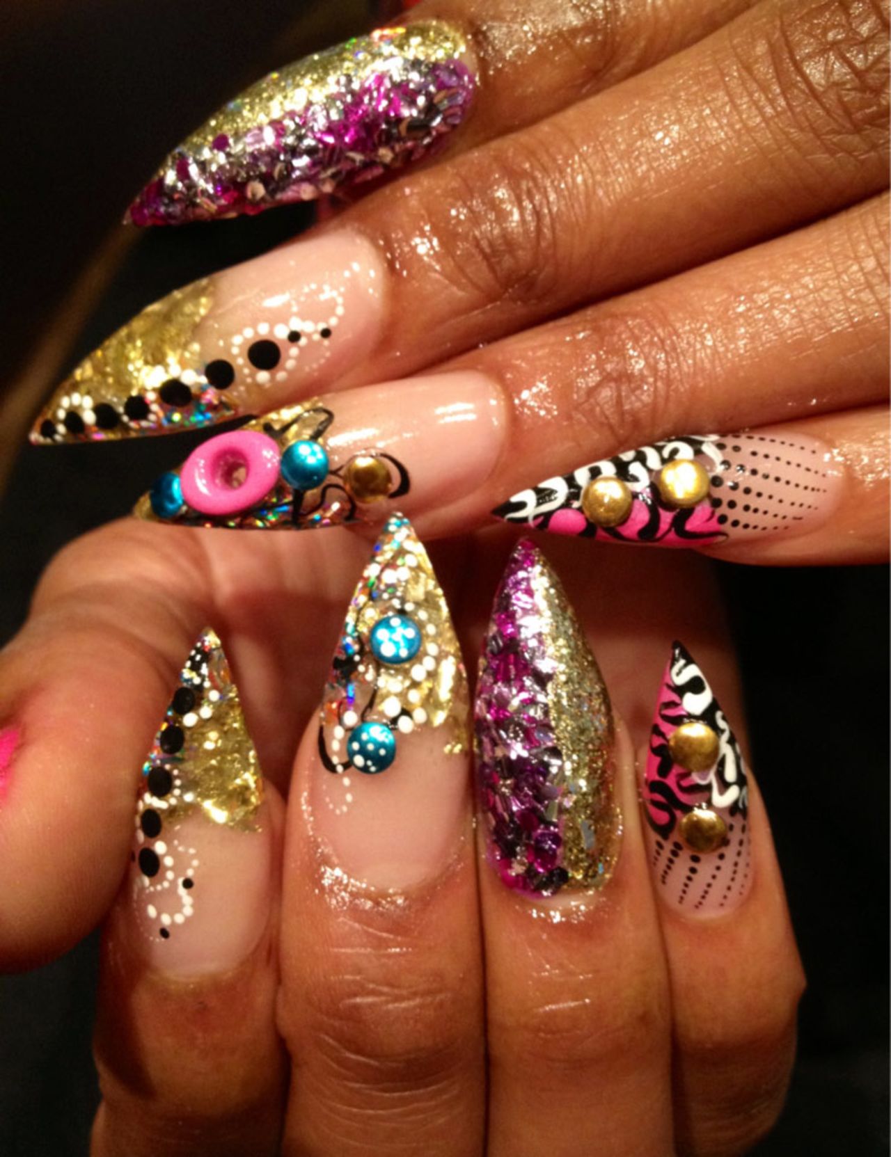 Nail technicians from across the country attend Tashina "Poochie" Green's classes on how to create safe, eye-catching nail art.