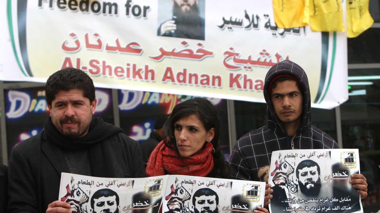 Palestinians in Ramallah, West Bank, support prisoner Khader Adnan, who has been on a hunger strike since December 18.