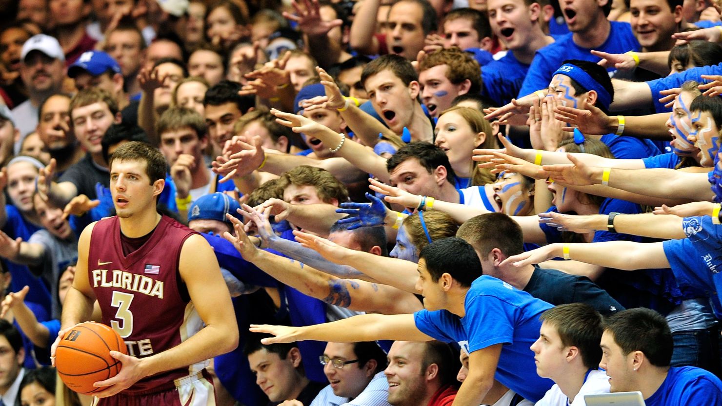 At Cameron Indoor Stadium, Duke fans do their best to distract players on the opposing team.