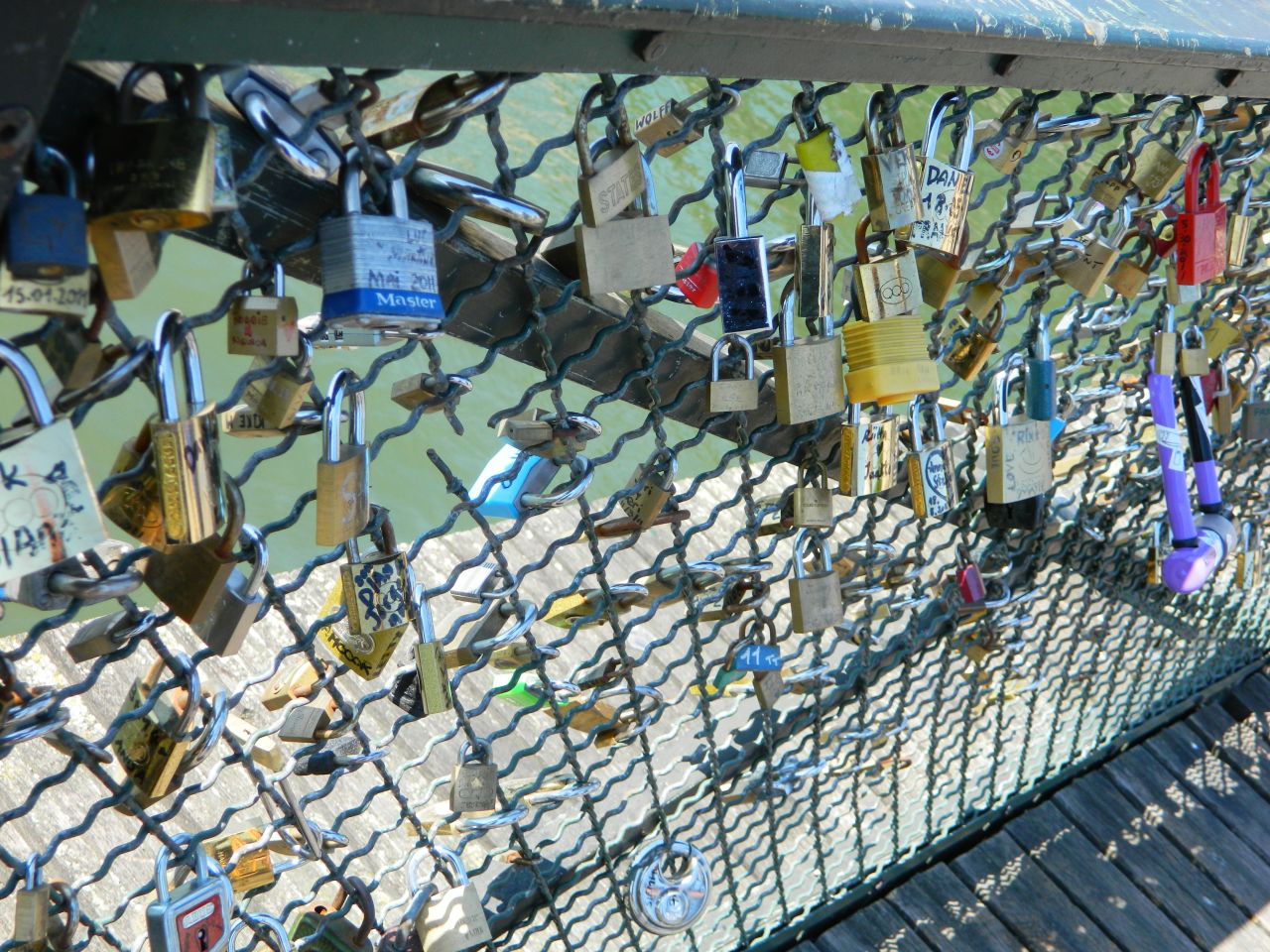 Allie Roberts took this photo of the "love locks" on the Pont de l'Archevêché, known as the Archbishop's Bridge. "Couples write their names on padlocks, lock them to a bridge over the river, and throw the key in the river, signifying that their love will last forever."