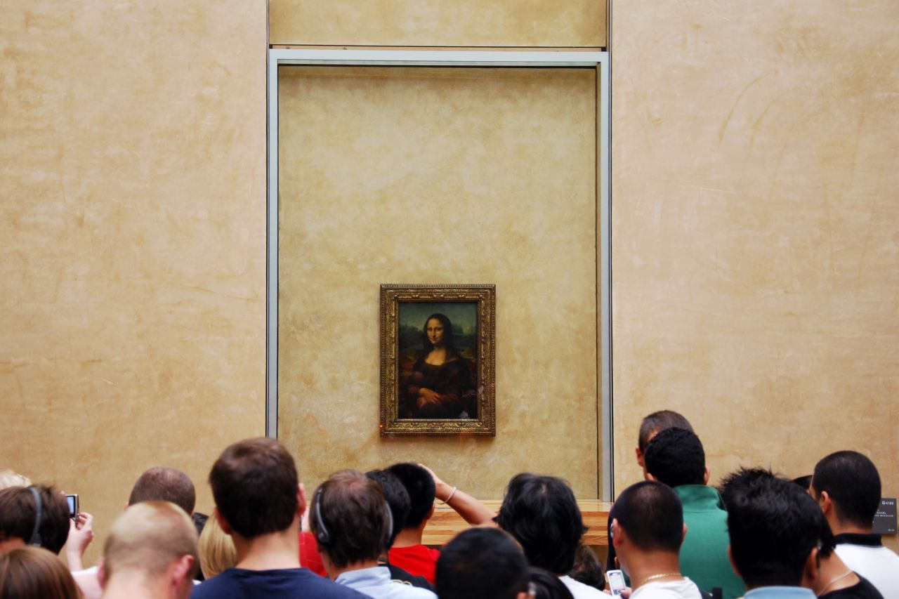 Kevin Kasmai snapped this photo of curious onlookers taking in the "beauty and mystery" of the famous Mona Lisa painting at the Louvre. 